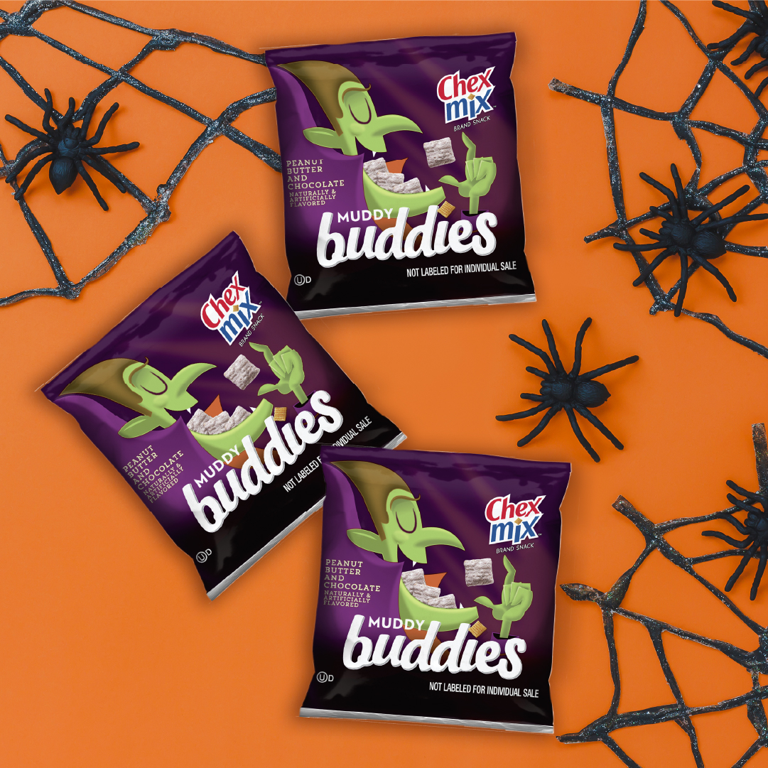 Chex Mix Muddy Buddies individual snack sized pouches displayed on an orange background with spider web and spider illustrations.